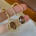 Load image into Gallery viewer, OLIVE ΣΚΟΥΛΑΡΙΚΙΑ ΟΡΕΙΧΑΛΚΟΥ ΜΕ ΚΡΥΣΤΑΛΛΑ BESCE0102