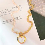 Load image into Gallery viewer, HALF HEART ΚΟΛΙΕ ΟΡΕΙΧΑΛΚΟΥ ΜΕ ΚΑΡΔΙΑ BESCL0090